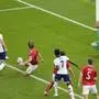 England's Harry Kane, left, scores the opening goal during a Group C match between Denmark and England at the Euro 2024 soccer tournament in Frankfurt, Germany, Thursday, June 20, 2024. (AP Photo/Darko Vojinovic)