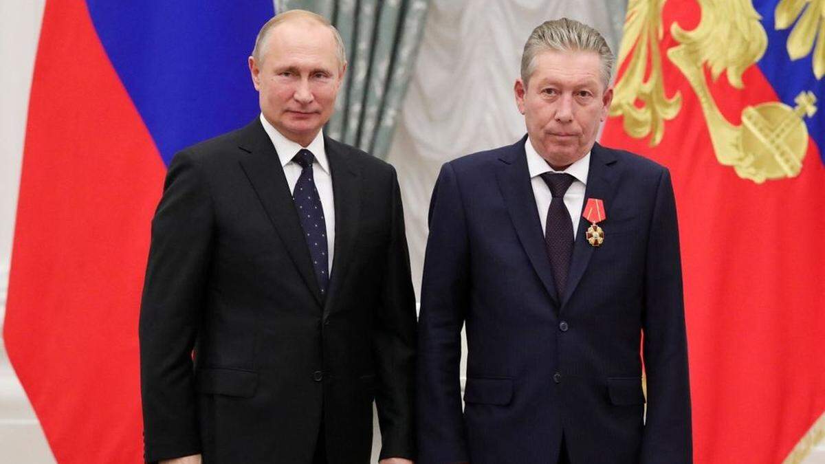 Russlands Präsident Wladimir Putin und Lukoil-Chef Rawil Maganow