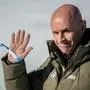 FIS President Johan Eliasch waves at the end of the FIS Alpine Ski World Cup 2025-2026, in St Moritz, south-eastern Switzerland on December 13, 2025. (Photo by Fabrice COFFRINI / AFP)