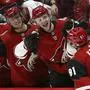 Arizona Coyotes right wing Phil Kessel (81) celebrates his goal against the Minnesota Wild with Derek Stepan, left, Michael Grabner, second from left, and Christian Fischer (36) during the first period of an NHL hockey game Thursday, Dec. 19, 2019, in Glendale, Ariz. (AP Photo/Ross D. Franklin)