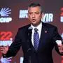 Leader of Turkey's main opposition party, Republican People's Party (CHP), Ozgur Ozel, gestures as he speaks on stageduting the CHP's extraordinary congress, in Ankara on September 21, 2025. (Photo by Adem ALTAN / AFP)