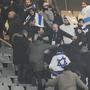 Fans argue on stands during the UEFA Nations League soccer match between France and Israel at the Stade de France stadium in Saint-Denis, outside Paris, Thursday Nov. 14, 2024. (AP Photo/Thibault Camus)