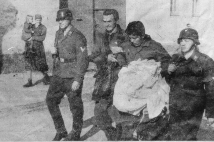 Festnahme von zwei Besatzungsangehörigen eines abgestürzten US-Bombers unweit von Wien im April 1944. Diese Aufnahme wurde in NS-Zeitungen gezeigt.