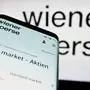 Mobile phone with website of Austrian stock exchange company Wiener Börse AG in front of logo. Stuttgart, Germany - 04-13-2024: Mobile phone with website of Austrian stock exchange company Wiener Börse AG in front of business logo. Focus on top-left of phone display. Copyright: xZoonar.com/TimonxSchneiderx 21766090