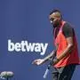 Nick Kyrgios of Australia reacts after losing a point to Jannik Sinner of Italy, during the Miami Open tennis tournament, Tuesday, March 29, 2022, in Miami Gardens, Fla. (AP Photo/Wilfredo Lee)