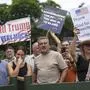 FILE - White South Africans demonstrate in support of U.S. President Donald Trump in front of the U.S. embassy in Pretoria, South Africa, Feb. 15, 2025. (AP Photo/Jerome Delay, File)