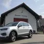 Test mit Schräglage: Cheftester Walter Röhrl mit dem E-Scooter von Seat
