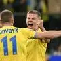 TOPSHOT - Ukraine's forward #11 Artem Dovbyk and Ukraine's midfielder #17 Oleksandr Zinchenko celebrate after the UEFA's EURO 2024 qualification final play off football match between Ukraine and Iceland, in Wroclaw, Poland, on March 26, 2024. (Photo by Sergei GAPON / AFP)