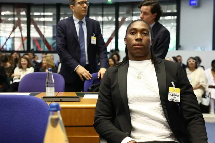 South Africa’s double Olympic champion Caster Semenya looks on as she sits for the start of her hearing at the European Court of Human Rights (ECHR) in Strasbourg, eastern France, on May 15, 2024. Caster Semenya's costly legal marathon enters its last lap as the highest chamber of the European Court of Human Rights (ECHR) begins a hearing into whether the double Olympic champion can be required to lower her testosterone levels to compete. (Photo by Frederick FLORIN / AFP)