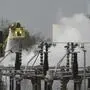 Firefighters extinguish the fire at the North Hyde electrical substation, which caught fire Thursday night and lead to a closure of Heathrow Airport in London, Friday, March 21, 2025.(AP Photo/Kirsty Wigglesworth)
