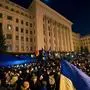 Activists attend a rally called "Night Watch" in front of Ukraine's President's office in Kiev, to demand "no capitulation" ahead of the next summit in Paris, on December 8, 2019. - Thousands of protesters are expected to rally in central Kiev a day before Russian President Vladimir Putin and Ukrainian leader Volodymyr Zelensky meet for the first time in a bid to ease tensions and end a five-year conflict in eastern Ukraine. Ukraine's former president Petro Poroshenko, ex-PM Yulia Tymoshenko and rock star-turned-politician Sviatoslav Vakarchuk are expected to participate in a protest calling on Zelensky not to betray Ukraine's interests. (Photo by Sergei SUPINSKY / AFP)