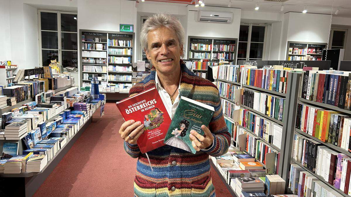 Thomas Brezina mit seinen neuen Büchern in der Buchhandlung Moser in Graz