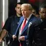 Former US president Donald Trump walks out to speak to the press during his trial for allegedly covering up hush money payments linked to extramarital affairs, at Manhattan Criminal Court in New York on April 30, 2024. Judge Juan Merchan, presiding over Donald Trump's hush money trial, fined the former president on Tuesday for defying a gag order and warned that further violations could result in jail time. (Photo by JUSTIN LANE / POOL / AFP)