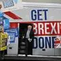 FILE - Britain's Prime Minister Boris Johnson addresses his supporters prior to boarding his General Election campaign trail bus in Manchester, England, Friday, Nov. 15, 2019. He was the mayor who reveled in the glory of hosting the 2012 London Olympics, and the man who led the Conservatives to a whopping election victory on the back of his mission to “get Brexit done.” But Boris Johnson’s time as prime minister was marred by his handling of the coronavirus pandemic and a steady stream of ethics allegations.  (AP Photo/Frank Augstein, Pool, File)