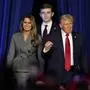 FILE - Republican presidential nominee former President Donald Trump, joined by wife Melania Trump, left, and son Barron Trump, arrives to speak at an election night watch party, Nov. 6, 2024, in West Palm Beach, Fla. (AP Photo/Alex Brandon, File)