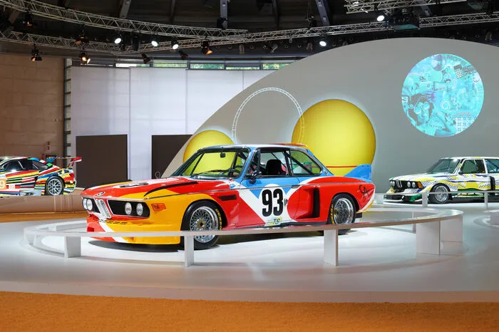 Aufgrund seiner Initiative bemalte der US-amerikanische Künstler Alexander Calder 1975 einen BMW 3.0 CSL. Poulain fuhr diesen Wagen selbst beim 24-Stunden-Rennen von Le Mans 1975.