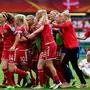 Denmark's players react after winning the quarter-final UEFA Women's Euro 2017 football match against Germany at Stadium Sparta Rotterdam in Rotterdam on July 30, 2017.  / AFP PHOTO / TOBIAS SCHWARZ