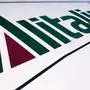(FILES) In this file photo taken on June 04, 2019 The logo of Italy's flag carrier Alitalia is pictured on a wing of an Airbus A320 at Rome's Fiumicino airport. - Italy's government said on March 17, 2020 it will re-nationalise the bankrupt former national carrier Alitalia to make sure crises like the coronavirus pandemic never strand its compatriots abroad. (Photo by Alberto PIZZOLI / AFP); Sujet