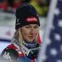 United States' Mikaela Shiffrin stands on podium after winning an alpine ski, women's World Cup slalom in Flachau, Austria, Tuesday, Jan.16, 2024. (AP Photo/Marco Trovati)