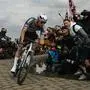 TOPSHOT - Alpecin-Deceuninck's Dutch rider Mathieu van der Poel cycles in a breakaway leading the race at the Carrefour de l'Arbre, a cobblestone road, during the 122nd edition of the Paris-Roubaix one-day classic cycling race, 259,2 km between Compiegne and Roubaix, northern France on April 13, 2025. (Photo by Jeff PACHOUD / AFP)