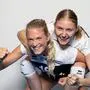 GRAZ,AUSTRIA,28.SEP.23 - VOLLEYBALL - SG Trofaiach/ Eisenerz, team photo shooting. Image shows the rejoicing of Anna Lena Bruchmann and Theresa Scheitz (Trofaiach). Photo: GEPA pictures/ Mario Buehner-Weinrauch