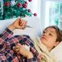 Sick woman portrait during christmas holiday at home