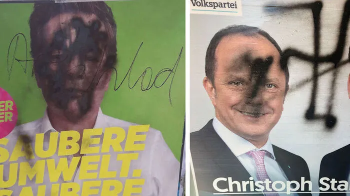 Beschmierte Plakate von Werner Kogler und Christoph Stark