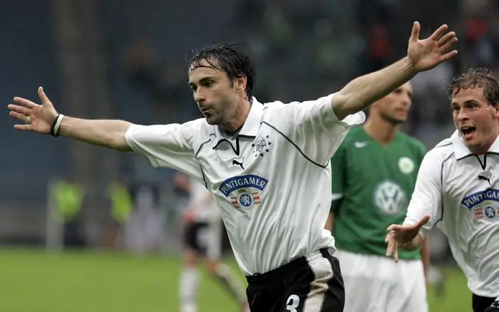 GEPA-0907054132 - GRAZ,AUSTRIA,09.JUL.05 - FUSSBALL - UI Cup, Sturm Graz vs VfL Wolfsburg. Bild zeigt die jubelnden Guenther Neukirchner und Juergen Saeumel (Sturm). Foto: GEPA pictures/ Wolfgang Grebien