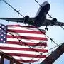 22 January 2025: Symbolic image for deportations from the USA. In the foreground barbed wire and the American flag, above an airplane taking off. Depiction of illegal immigration and migration to the United States. PHOTOMONTAGE *** Symbolbild für Abschiebungen aus den USA. Im Vordergrund Stacheldraht und die amerikanische Flagge, darüber ein startendes Flugzeug. Darstellung von illegaler Zuwanderung und Migration in die Vereinigten Staaten. FOTOMONTAGE
