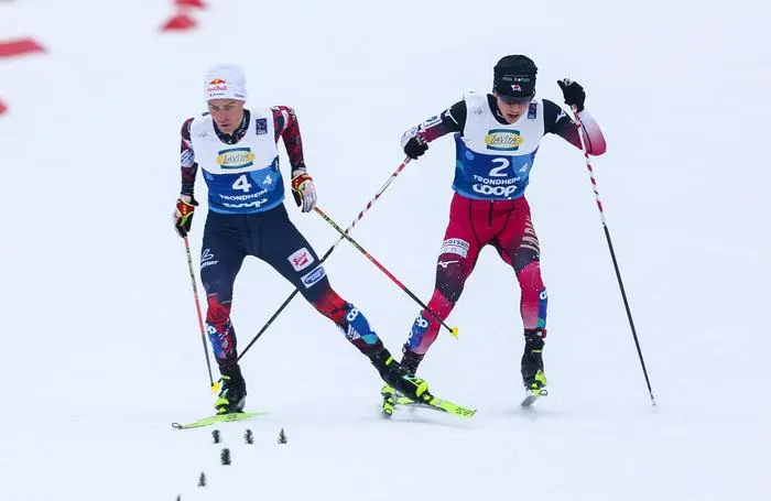 TRONDHEIM,NORWAY,28.FEB.25 - NORDIC SKIING, NORDIC COMBINED, CROSS COUNTRY SKIING - FIS Nordic World Ski Championships, mixed team relay, 2x2.5km 2x5km. Image shows Johannes Lamparter (AUT) and Ryota Yamamoto (JPN).
Photo: GEPA pictures/ Harald Steiner