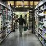 People shop in a supermarket in the Manhattan borough of New York City on February 20, 2025. (Photo by CHARLY TRIBALLEAU / AFP)