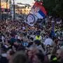Thousands of high-school students and protesters march in silence through central Belgrade in the latest of months of anti-graft demonstrations piling pressure on Serbian President Aleksandar Vucic, in Belgrade on September 1, 2025. The rally passed off peacefully, unlike ones in mid-August that degenerated into violence from what protesters said was heavy-handed tactics by government loyalists and police. The regular demonstrations started over a fatal train-station roof collapse 10 months ago, quickly became a symbol of entrenched corruption in the Balkan nation. (Photo by Andrej ISAKOVIC / AFP)