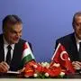 Hungary's Prime Minister Viktor Orban, left, and his Turkish counterpart Recep Tayyip Erdogan sign agreements in Ankara, Turkey, Wednesday, Dec. 18, 2013. Orban is in Turkey for a three-day official visit. (AP Photo/Burhan Ozbilici)