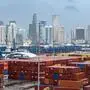 Shipping containers are seen at the Port of Miami in Miami, Florida, on August 7, 2025. Higher US tariffs came into effect for dozens of economies on August 7, drastically raising the stakes in President Donald Trump's wide-ranging efforts to reshape global trade. As an executive order signed last week by Trump took effect, US duties rose from 10 percent to levels between 15 percent and 41 percent for a list of trading partners. (Photo by CHANDAN KHANNA / AFP)