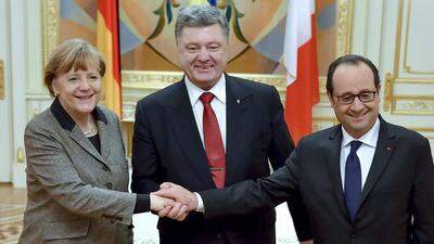 Angela Merkel, Petro Poroschenko und Francois Hollande in Kiew