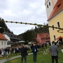 Bei der Palmweihe in Kainach bei Voitsberg wurden zwei rund 18 Meter lange Palmbuschen geweiht
