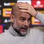 Manchester City manager Pep Guardiola reacts during a press conference at the City Football Academy in Manchester, England, Tuesday Jan. 28, 2025. (Martin Rickett/PA via AP)