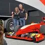 Sigrid und Christian Ferstl mit ihrem Hund "Lucky" und dem Rennauto