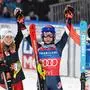Winner USA's Mikaela Shiffrin (C), second placed Austria's Katharina Liensberger (L) and third placed Germany's Lena Duerr celebrate after after the women's slalom event during the FIS Alpine Skiing World Cup in Levi, Finland on November 16, 2024. (Photo by Jussi Nukari / LEHTIKUVA / AFP) / Finland OUT