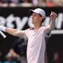 Italy's Jannik Sinner celebrates victory against Serbia's Novak Djokovic during their men's singles semi-final match on day 13 of the Australian Open tennis tournament in Melbourne on January 26, 2024. (Photo by Martin KEEP / AFP) / -- IMAGE RESTRICTED TO EDITORIAL USE - STRICTLY NO COMMERCIAL USE --