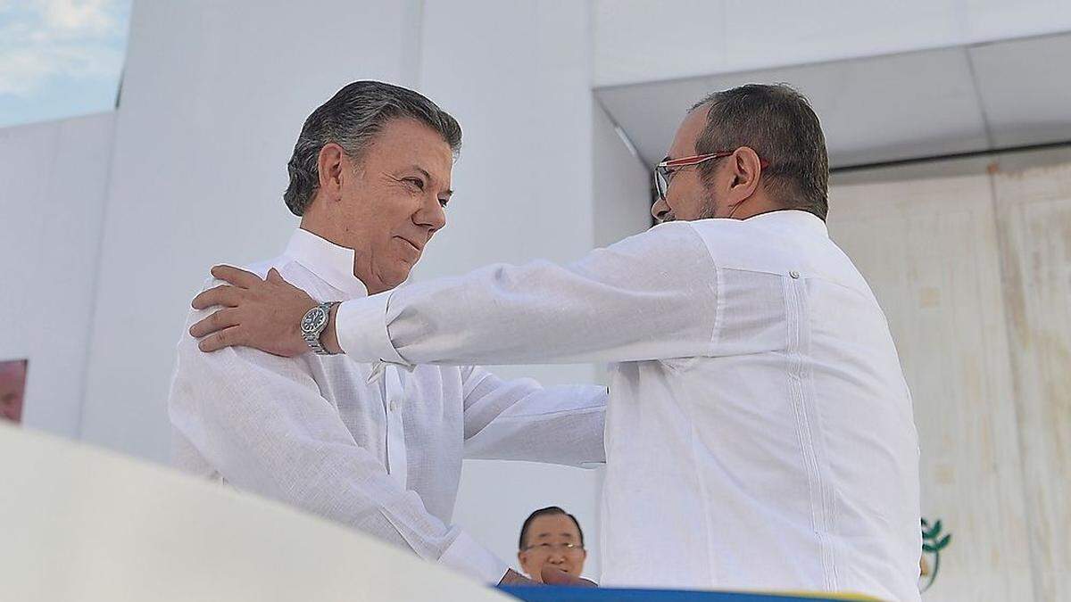 Präsident Santos und FARC-Kommandant Londono.