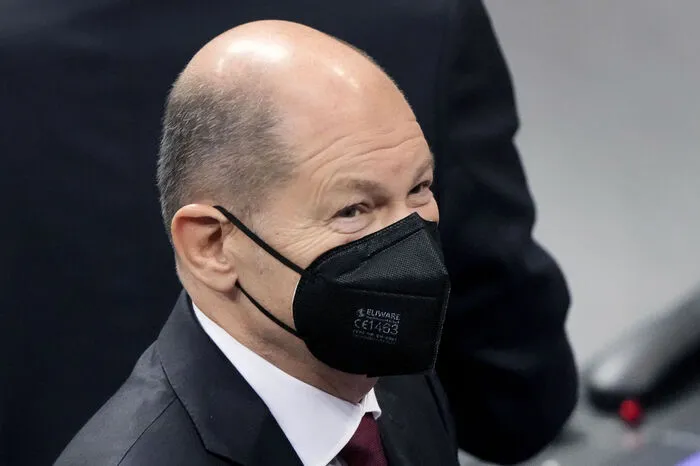 395 Abgeordnete votierten für Scholz - es gab zudem 303 Gegenstimmen und sechs Enthaltungen.