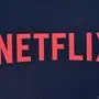 (FILES) In this file photo taken on June 28, 2019 Netflix logo is seen on the backdrop of Netflix's "Stranger Things 3" premiere at Santa Monica high school Barnum Hall in Santa Monica, California. - Netflix on October 3, 2019 said it was cooperating with a probe into whether it evaded taxes in Italy, even though it has no office or employees in that country. The crux of the matter appeared to be whether server units used to help handle the streaming load for the California-based firm were enough to designate it as having permanent status in Italy in the eyes of local tax collectors. (Photo by Chris Delmas / AFP)