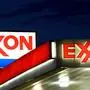 (FILES) An Exxon sign is seen at a station in this September 20, 2008 file  photo in Manassas, Virginia. - ExxonMobil's chief executive defended the company at its annual meeting on May 26, 2021 as the oil giant sought to fend off a major activist challenge over its policies to address climate change. ExxonMobil faces a number of climate-related votes at the gathering, which went into a one-hour recess late Wednesday morning following speeches from sponsors of the shareholder motions. (Photo by KAREN BLEIER / AFP FILES / AFP)