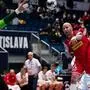 Robert Weber of Austria tries to score during the Men's European Handball Championship preliminary round Group D match between Belarus and Austria in Bratislava, Slovakia on January 18, 2022. (Photo by VLADIMIR SIMICEK / AFP)