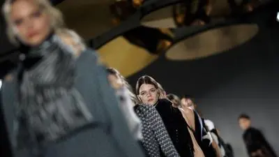 Models wear creations of designer Dorothee Schumacher during the Mercedes Benz Fashion Week in Berlin, Tuesday, Jan. 17, 2017. (AP Photo/Markus Schreiber)