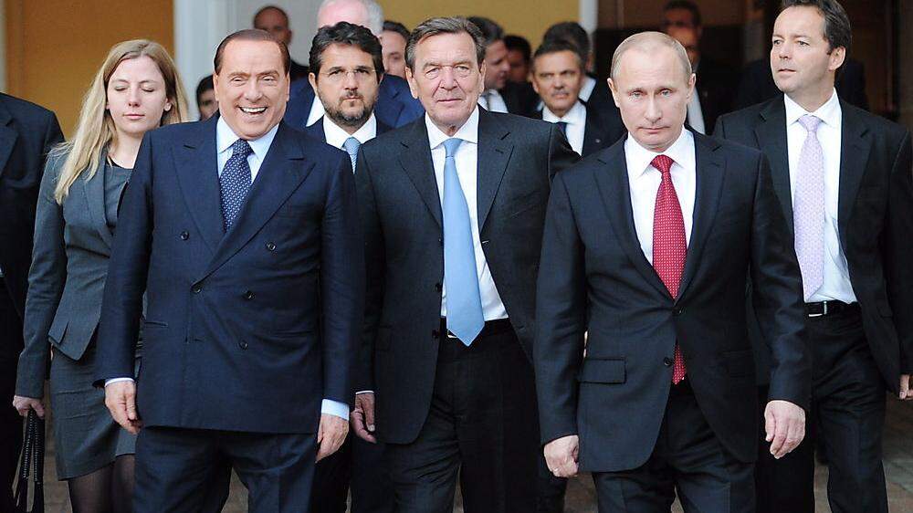 Man kennt sich: Berlusconi, Schröder, Putin 