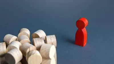Red man stands aside from crowd of people. Asocial. Integration into society. Self-isolation, contagious. Socialization. A stranger, exiled. The concept of loneliness and lack of communication. Red man stands aside from crowd of people. Asocial. Integration into society. Self-isolation, contagious. Socialization. A stranger, exiled. The concept of loneliness and lack of communication. Copyright: xZoonar.com/AndriixYalanskyix 17839455