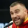 Kansas City Chiefs tight end Travis Kelce reacts when being asked about Taylor Swift in Frankfurt, Germany, Friday, Nov. 3, 2023. The Kansas City Chiefs are set to play the Miami Dolphins in a NFL game in Frankfurt on Sunday Nov. 5, 2023. (AP Photo/Michael Probst)