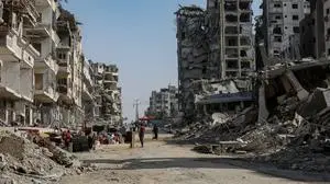Palestinians inspect their destroyed homes and neighborhood in the Al-Karama area of northern Gaza City Palestinians inspect their destroyed homes and neighborhood in the Al-Karama area of northern Gaza City, following the withdrawal of Israeli forces after the ceasefire agreement between Israel and Hamas. Gaza City, Gaza Strip, 17 October 2025. Photo by Omar Ashtawy apaimages Gaza city Gaza Strip Palestinian Territory 171025_Gaza_OSH_1_005 Copyright: xapaimagesxOmarxAshtawyxxapaimagesx
